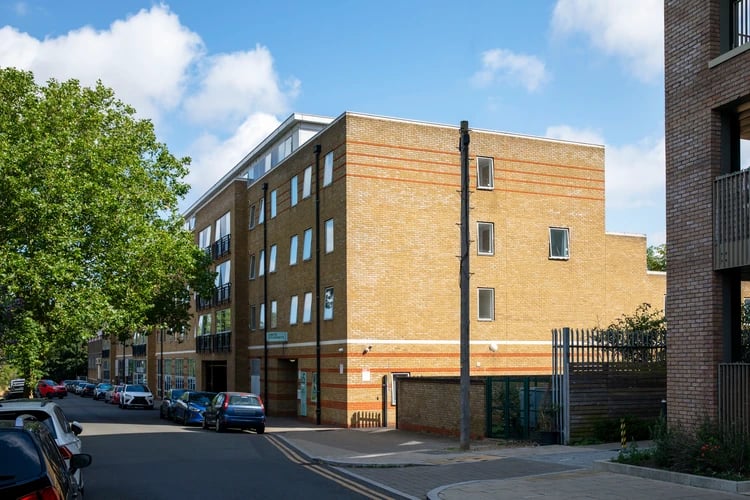 Modern brick building with many windows exterior at Ewen Henderson Court in London Student Accommodation