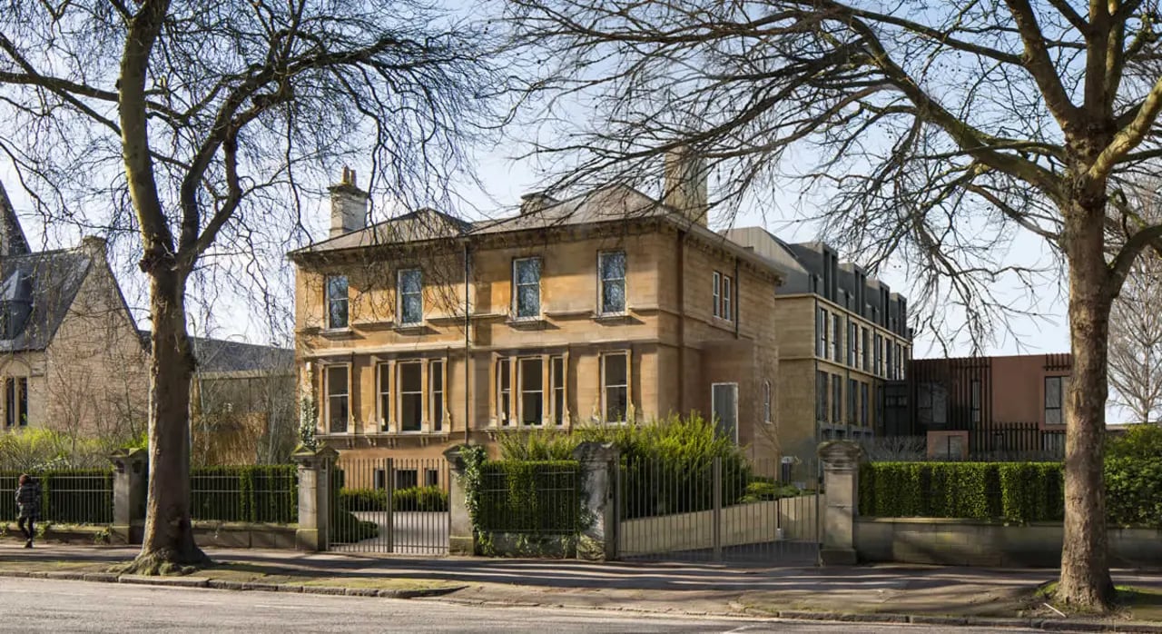 Large building with fence and trees exterior at Student Castle Bath in Bath Student Accommodation