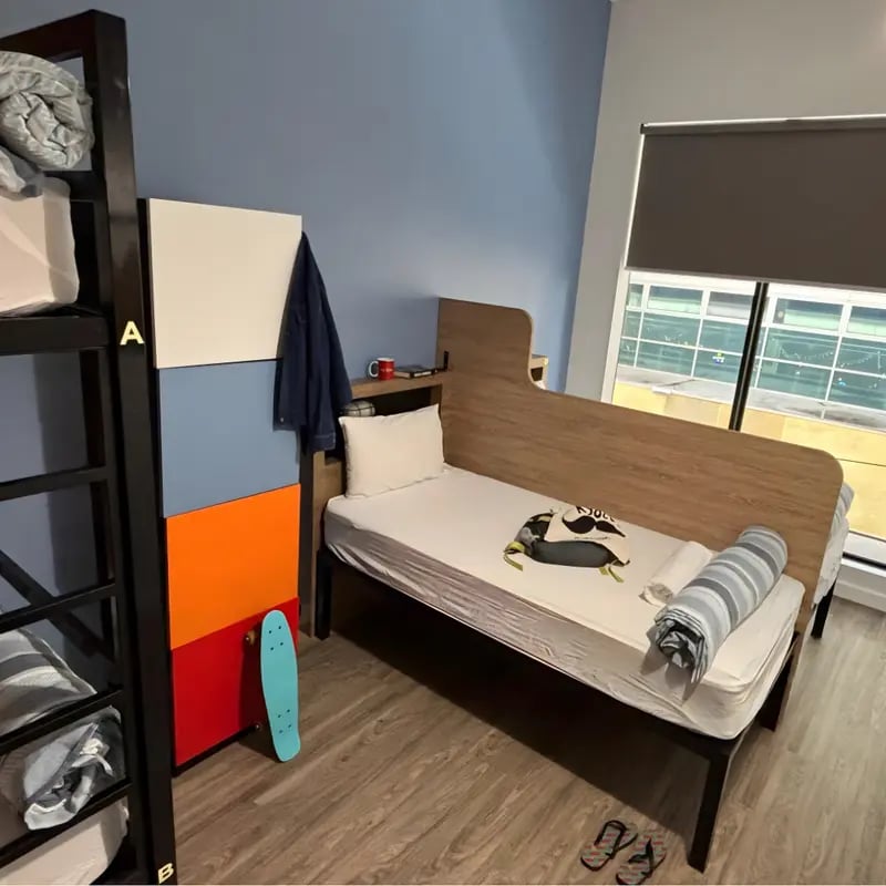 Bunk beds and single bed with skateboard bedroom at The G Living in Perth Student Accommodation