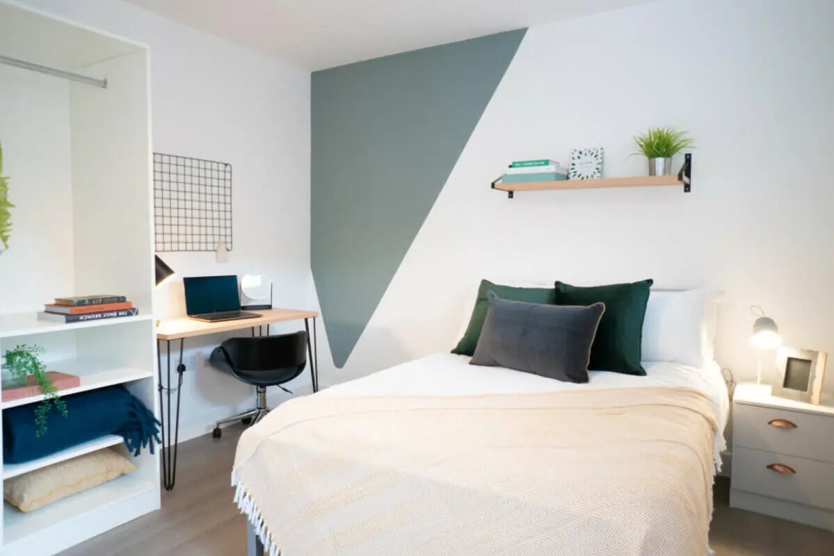 Bed desk shelves and chair bedroom at 8 Bedroom House at 79, Crofton Street in Manchester Student Accommodation