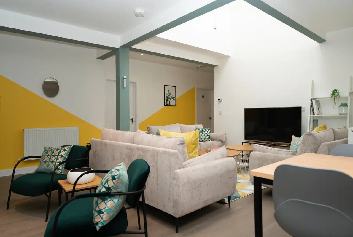 Modern living room with sofas and TV living room at 3 Bedroom House at Flat 1, 7, EILEEN GROVE in Manchester Student Accommodation