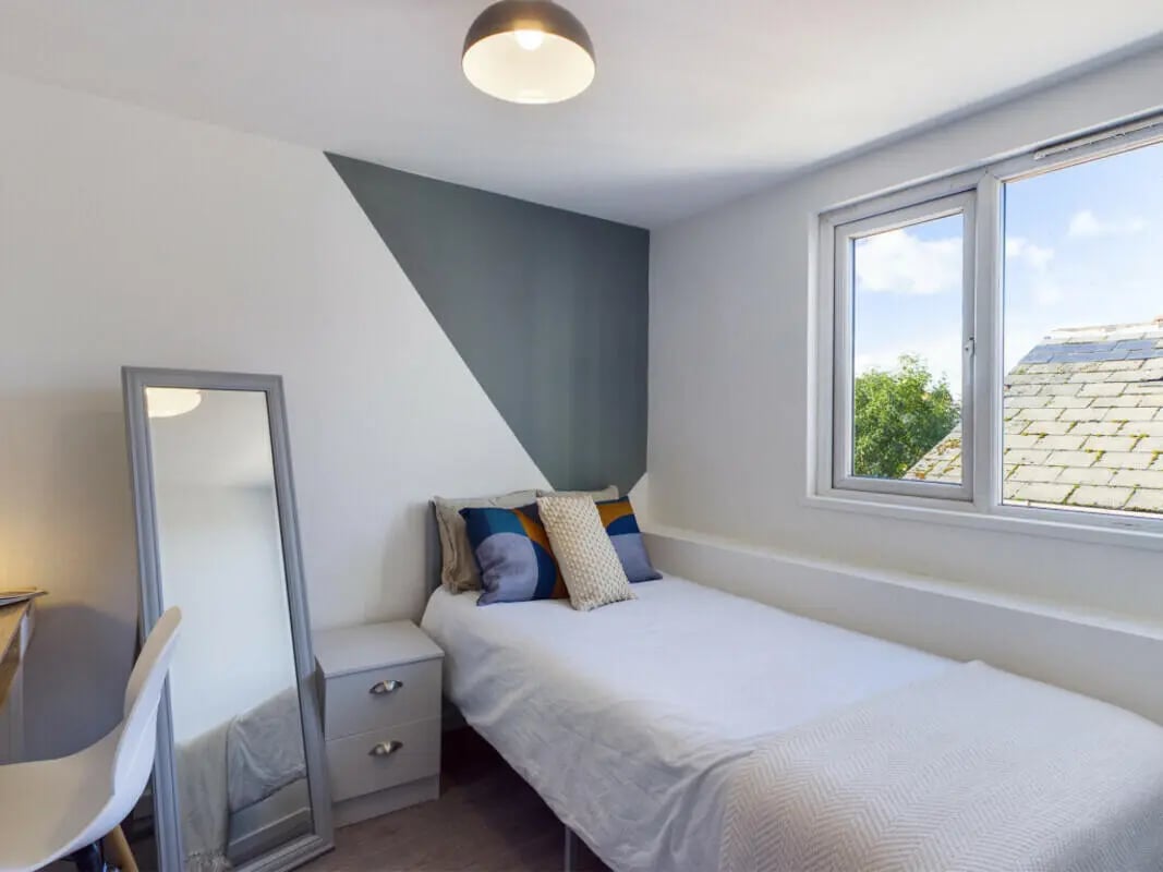 Bed nightstand mirror chair with desk bedroom at 2 Bedroom House at Flat 2 30, Haydn Avenue in Manchester Student Accommodation
