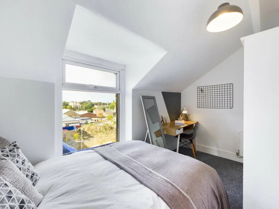 Bed desk mirror window view bedroom at 7 Bedroom House at 3, Ruskin Avenue in Manchester Student Accommodation