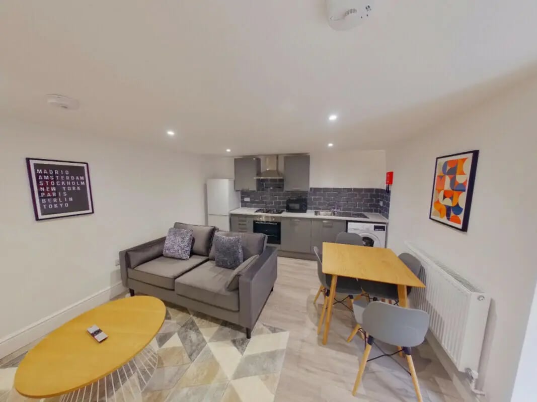 Sofa kitchen appliances dining table living kitchen at 2 Bedroom House at 20 E, Portland Street in Lincoln Student Accommodation