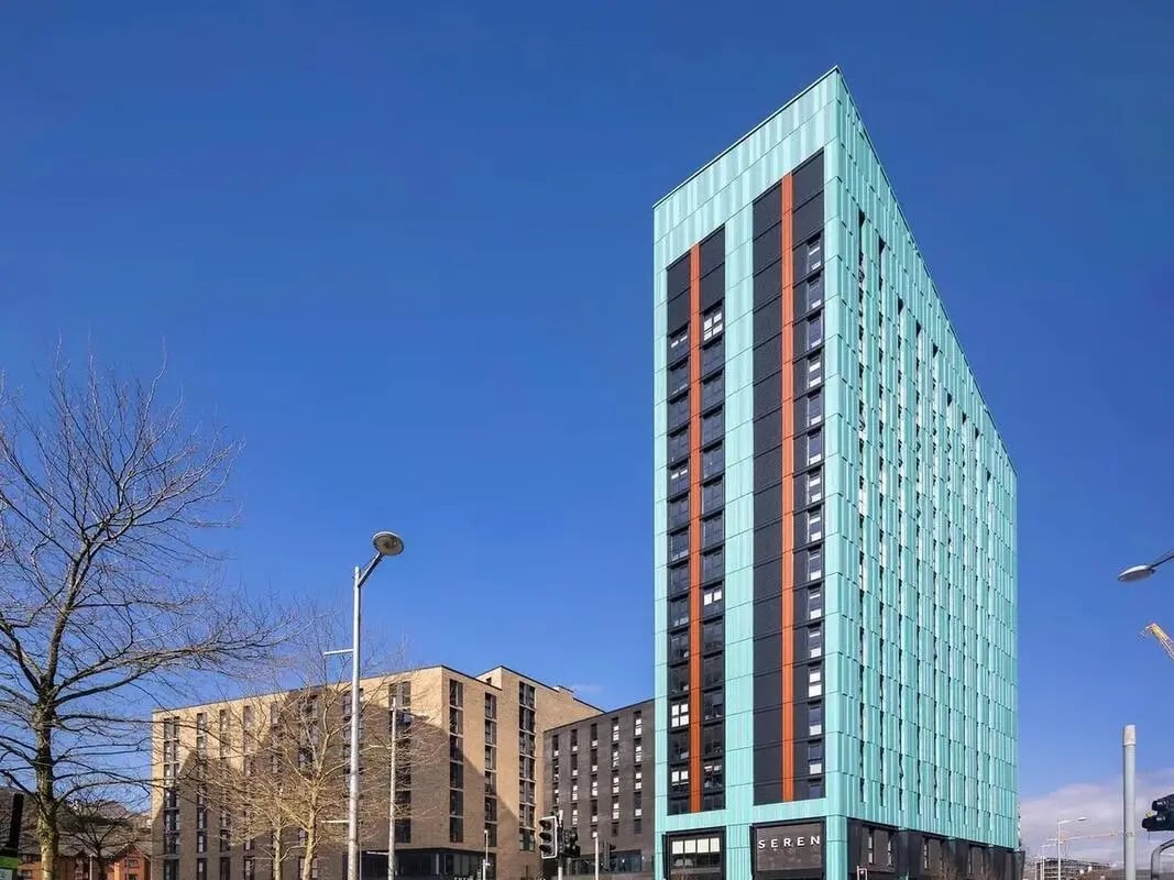 Tall modern building exterior with windows and balconies exterior at SEREN in Swansea Student Accommodation
