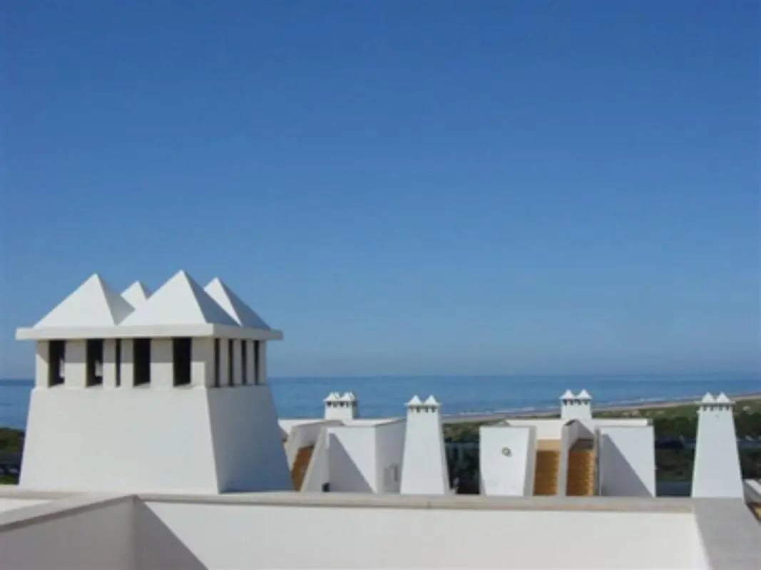 White chimneys ocean view exterior at Charming 2-bedroom house in a pinewood resort on the beach in Altura Student Accommodation