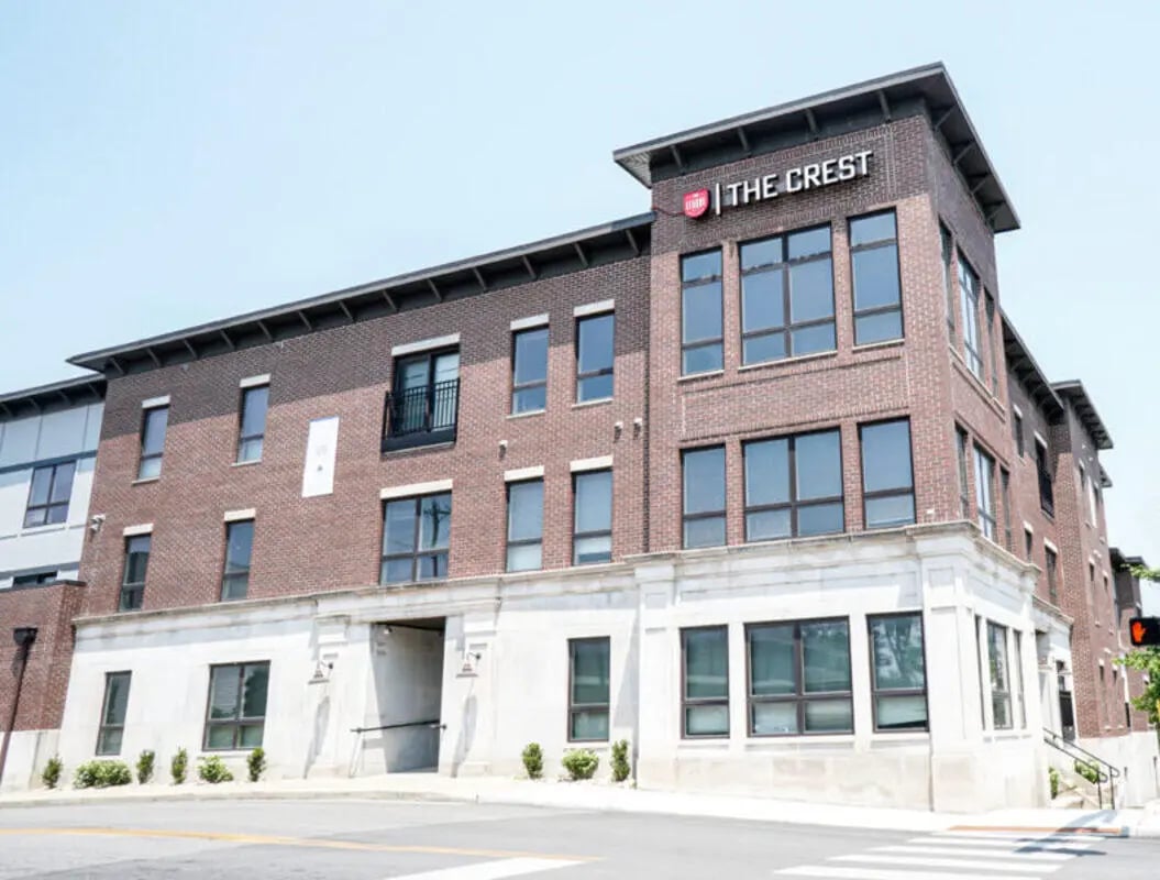 The Crest building with brick exterior exterior at 10 North in Bloomington Student Accommodation
