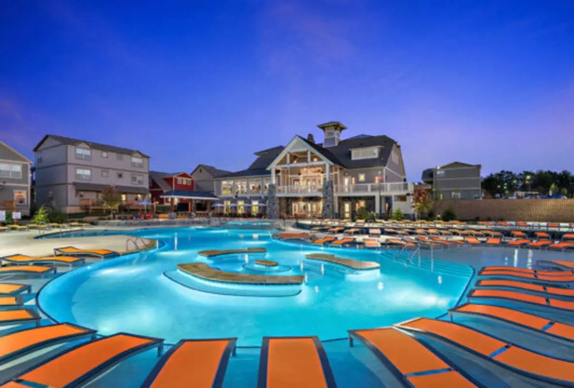 Resort style pool with lounge chairs exterior at Brexx at Blacksburg in Blacksburg Student Accommodation