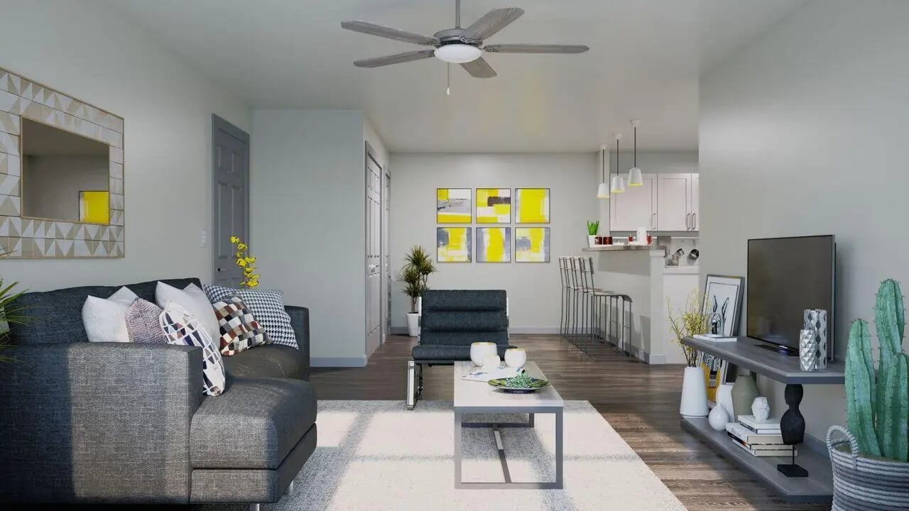 Sofa coffee table chairs TV kitchen bar living room at 698 Prospect in Pembroke Student Accommodation