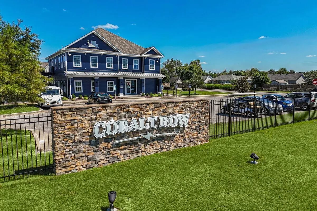 Cobalt Row sign building and cars exterior at Cobalt Row in Murfreesboro Student Accommodation