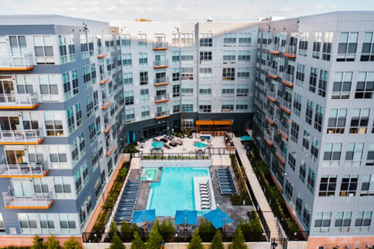 Apartment complex pool lounge area and seating exterior at ANOVA uCity Square in Philadelphia Student Accommodation