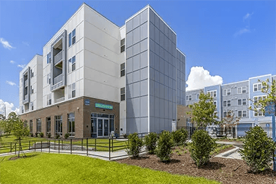 Modern student housing building exterior with landscaping Exterior at Uncommon Wilmington in Wilmington Student Accommodation