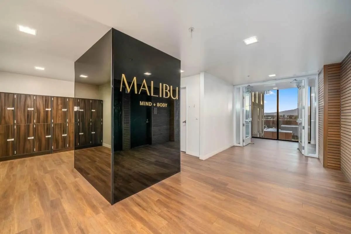 Wooden lockers glass sign and open doors Image at Malibu Tucson Apartments in Tucson Student Accommodation