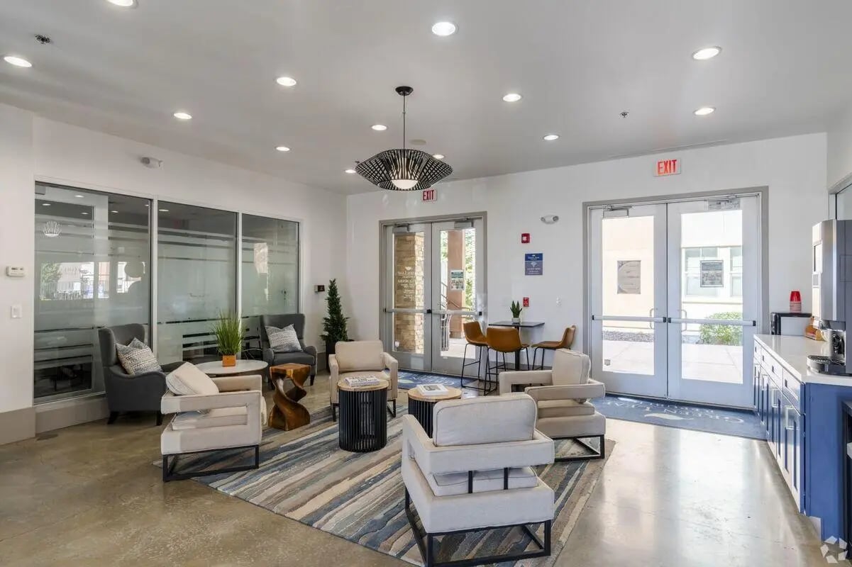 Lounge seating with tables and chairs living room at The Republic in Reno Student Accommodation