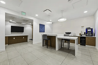 TV counter seating area with coffee machine common area at The View on Pavey Square in Columbus Student Accommodation