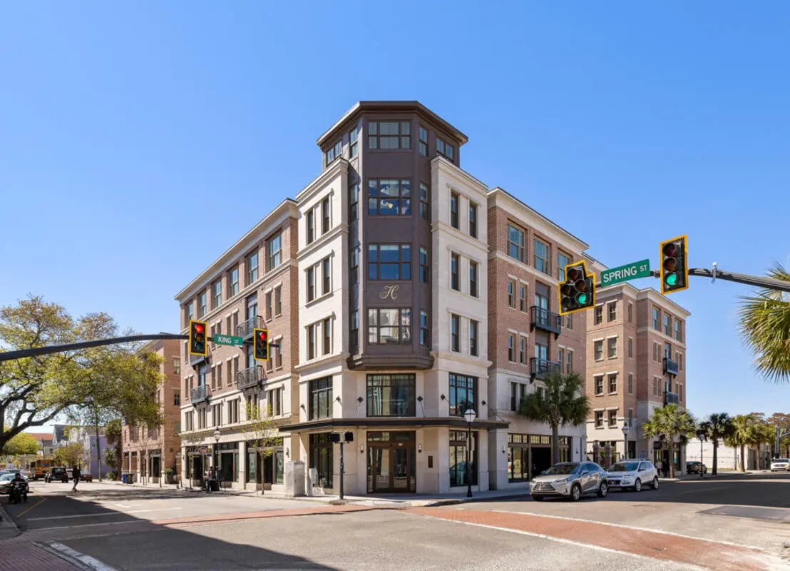 Modern brick building with H logo exterior at Hoffler Place in Charleston Student Accommodation