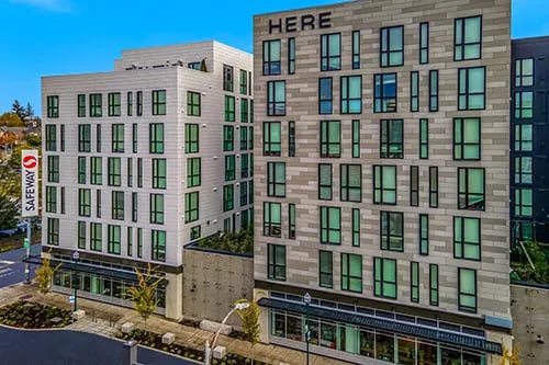 Modern apartment buildings with many windows exterior at HERE Seattle in Seattle Student Accommodation