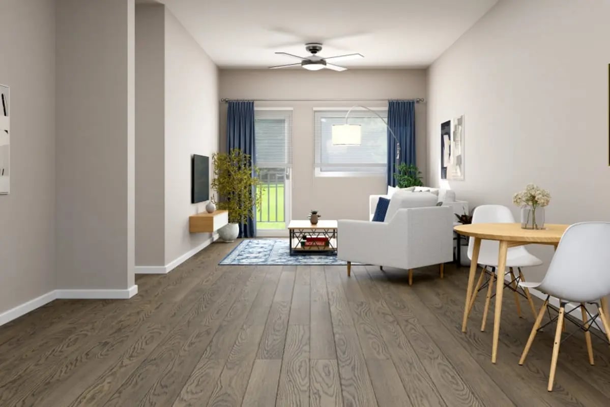 White sofa coffee table television wooden floor living room at Hawks Pointe II in Lawrence Student Accommodation
