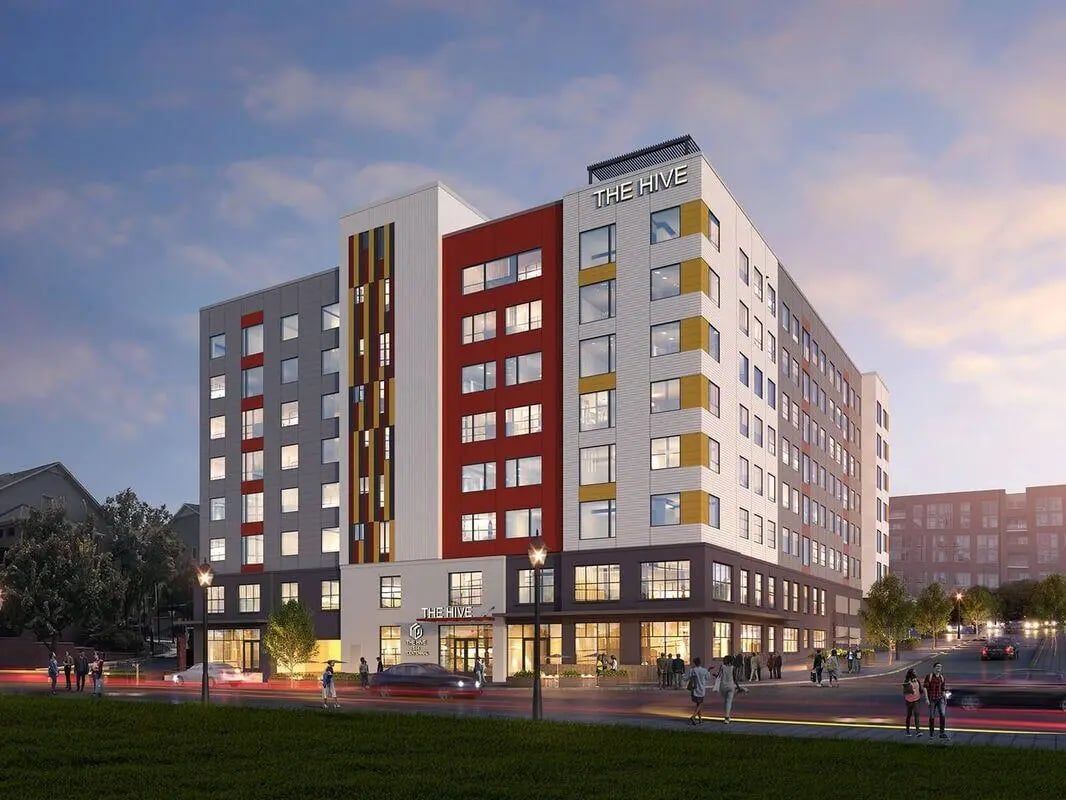 Modern apartment building with colorful accents exterior at The Hive in Atlanta Student Accommodation