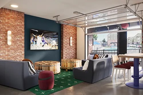Sofas television barrels and stools living room at Latitude Lexington in Lexington Student Accommodation