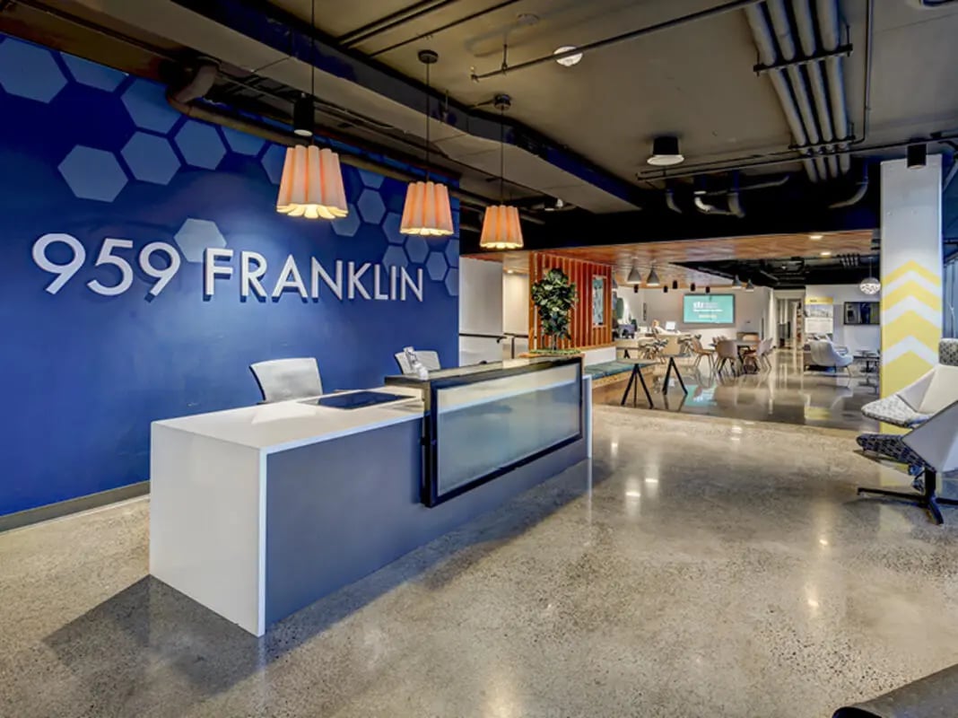959 Franklin reception desk with chairs lobby area at 959 Franklin in Eugene Student Accommodation