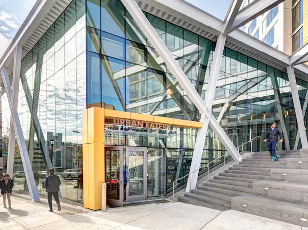 Modern building entrance with glass facade exterior at The Summit at University City in Philadelphia Student Accommodation