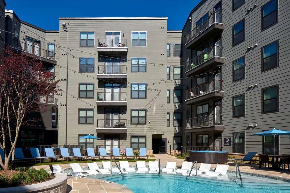 Swimming pool with lounge chairs exterior at 114 Earle in Clemson Student Accommodation