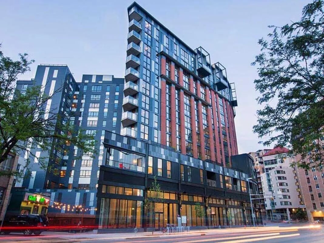 Modern apartment building with balconies exterior at The James in Madison Student Accommodation