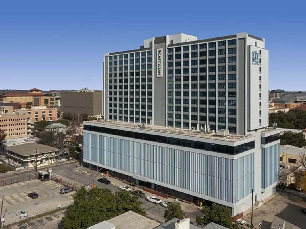 Modern building with many windows exterior at The Castilian in Austin Student Accommodation