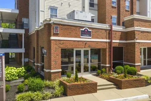 Building entrance with landscaping exterior at Registry Apartments in Bowling Green Student Accommodation