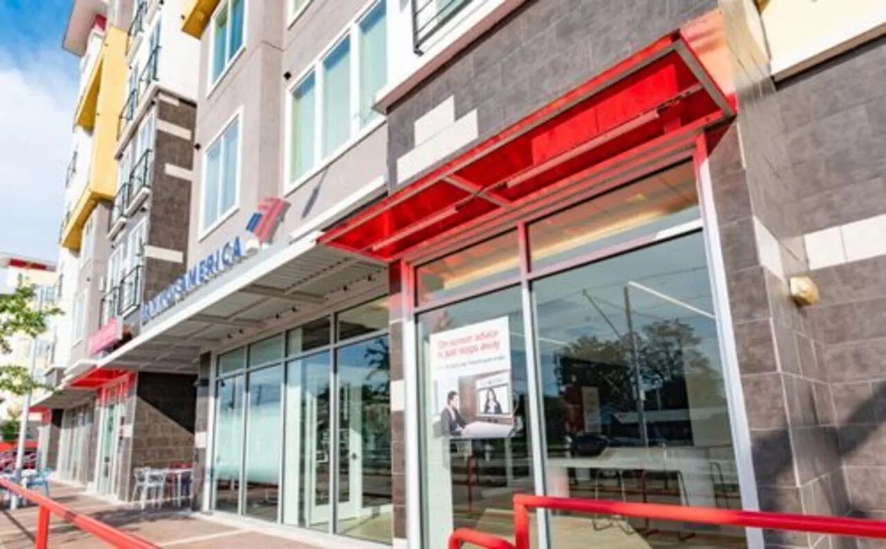 Bank of America building with red awnings exterior at The Icon & Lofts at the Icon in Houston Student Accommodation