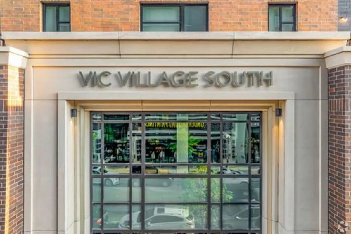 Vic Village South building entrance with windows exterior at Vic Village South in Ann Arbor Student Accommodation
