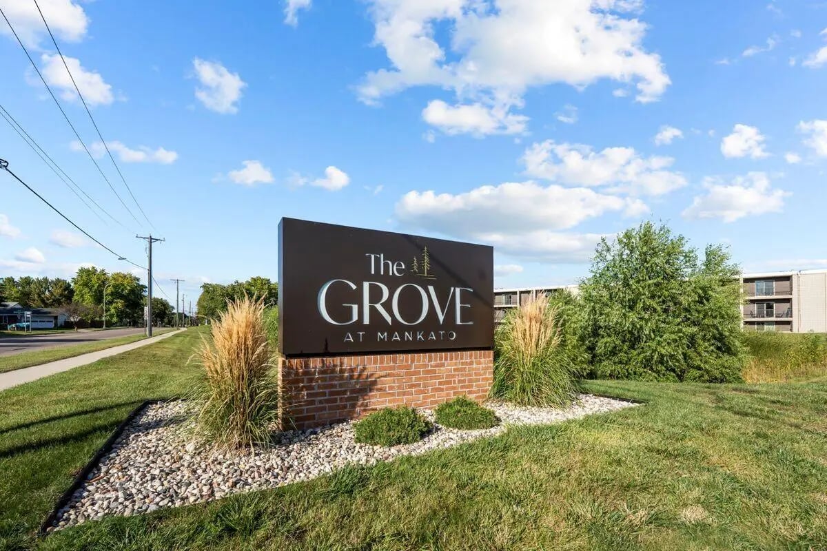 Sign for The Grove at Mankato building exterior at The Grove at Mankato in Mankato Student Accommodation