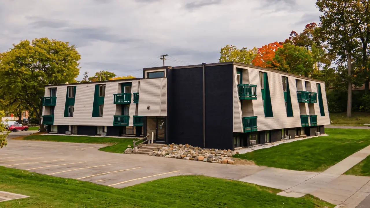 Apartment building with balconies exterior at Victory at Burcham Woods (731) in East Lansing Student Accommodation