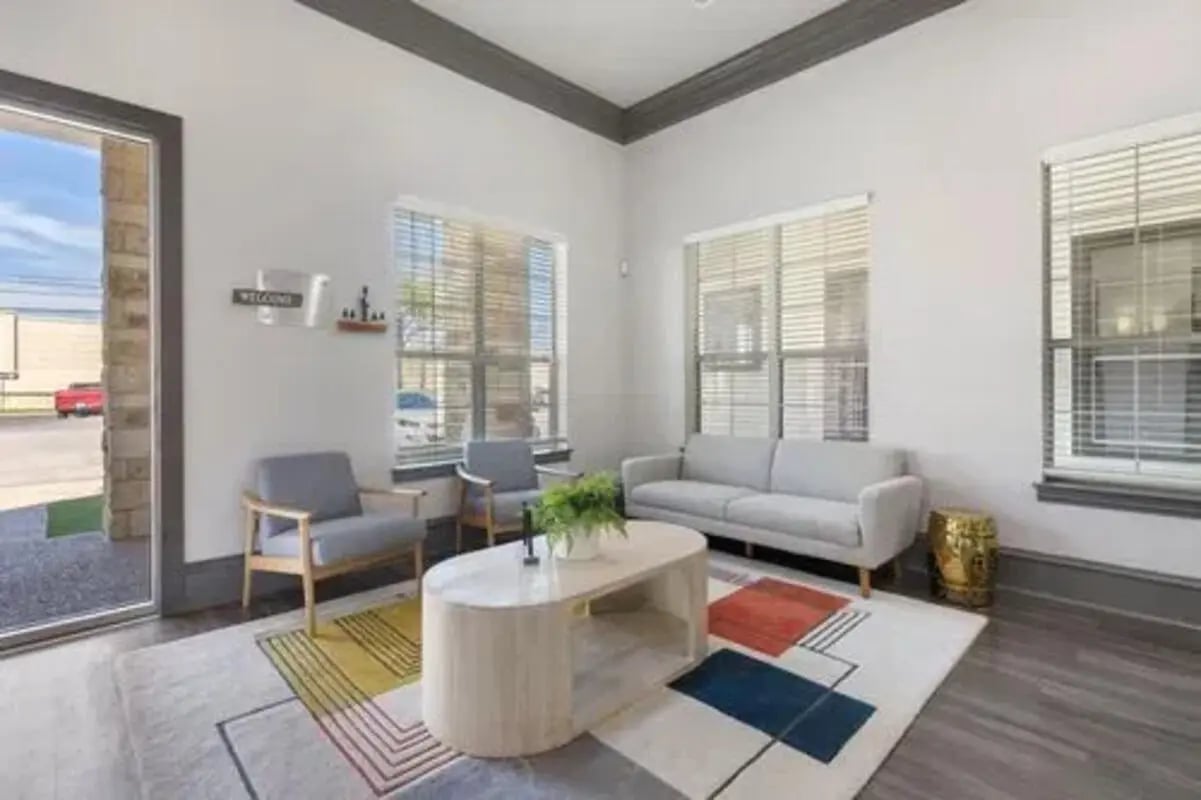 Modern seating area with sofa and chairs living room at Mirage San Marcos in San Marcos Student Accommodation