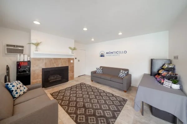 Two couches fireplace rug living room at Monticello Apartments in Provo Student Accommodation