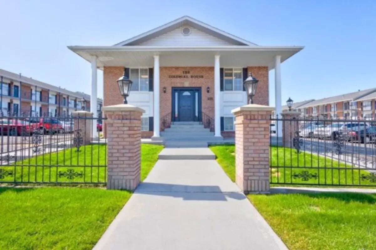 Brick pillars flanking entrance to property exterior at The Colonial House in Rexburg Student Accommodation