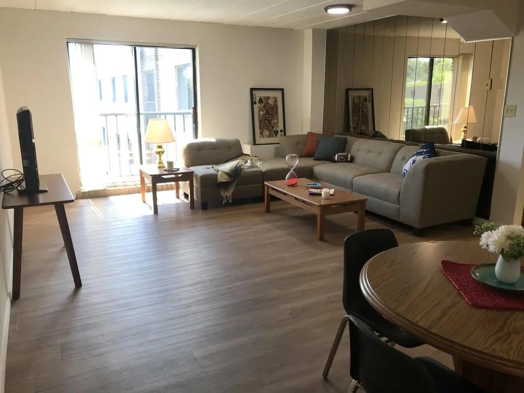 Sectional sofa coffee table hourglass on living room at Park Place Apartments in Provo Student Accommodation