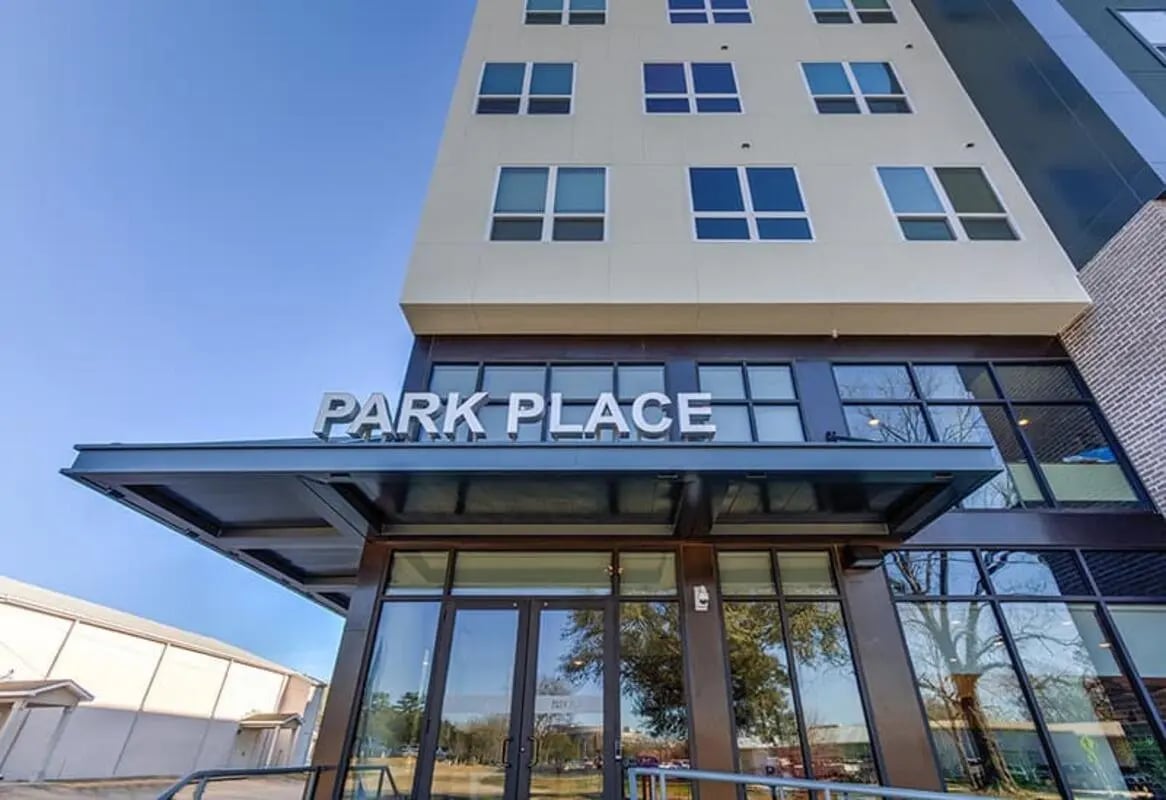 Park Place sign on modern building exterior at Park Place Baton Rouge in Baton Rouge Student Accommodation