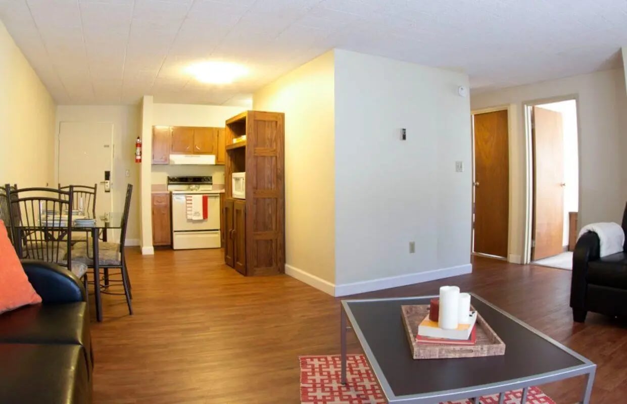 Kitchen dining living area with couch at Collegiate Arms in State College Student Accommodation