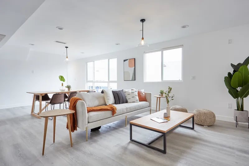 Sofa dining table coffee table living room at 1360 W 35th St in Los Angeles Student Accommodation