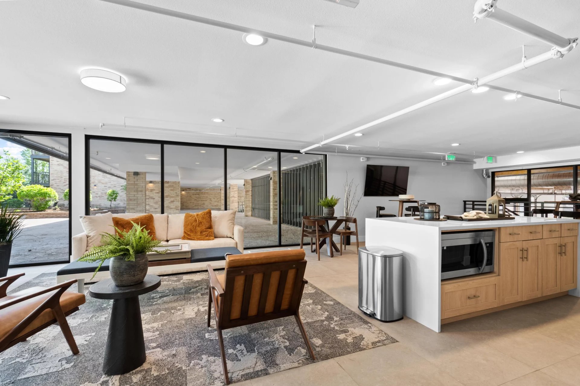 Sofa chairs kitchen island dining set living room at Mountainaire Boulder in Boulder Student Accommodation