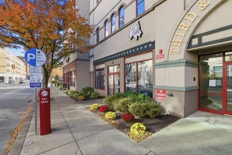 Sidewalk street parking sign with building exterior exterior at Polk On Third - Off Campus Student Housing in Bethlehem Student Accommodation