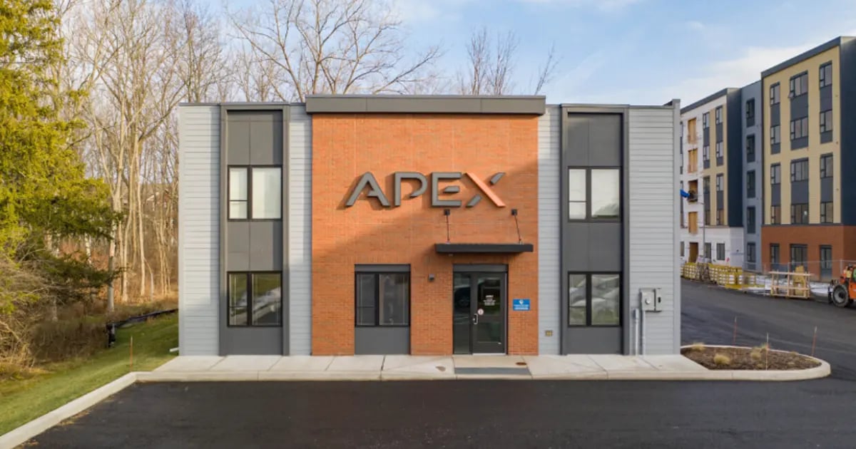 Apex building entrance with adjacent apartments exterior at Apex Apartments in Rochester Student Accommodation