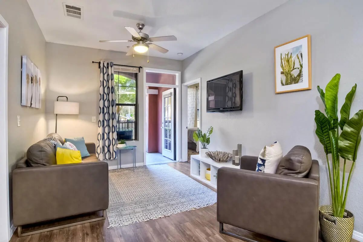 Living room with couches and TV living room at Fifty Twenty-Five Apartments in San Diego Student Accommodation