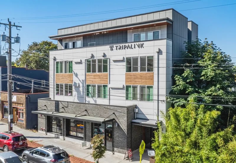 Modern Tripalink building with large windows exterior at Fifty Two Apartments in Seattle Student Accommodation