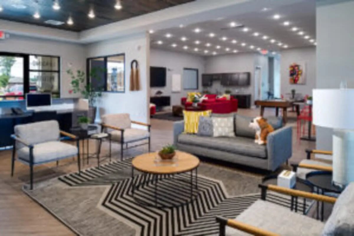 Sofa chairs coffee table with rug Living Room at Preserve at Tech in Ruston Student Accommodation