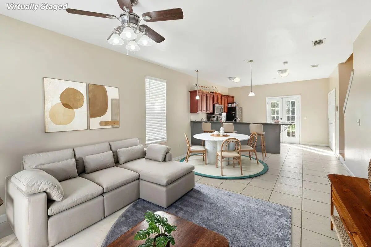 Lounge dining kitchen area with sofa dining table Image Type at Stadium Properties Apartments in Tallahassee Student Accommodation