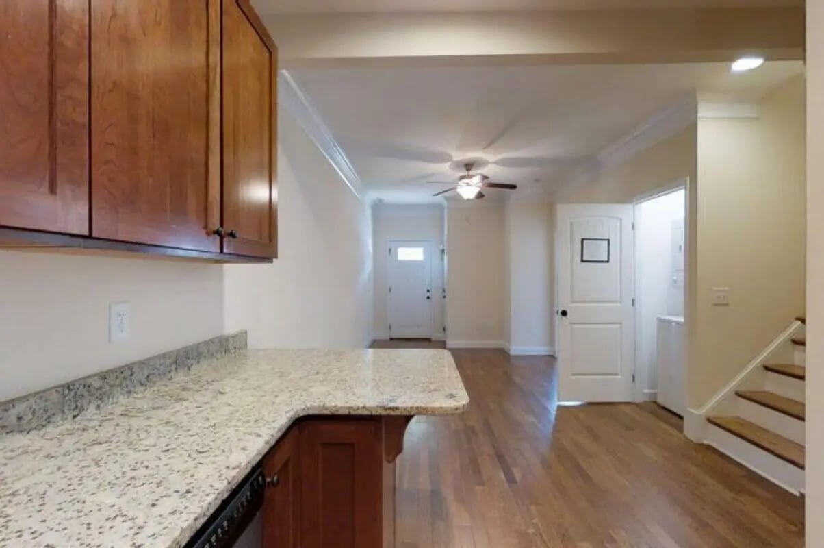 Countertops cabinets doors and stairs interior at Forrest Edge Townhomes in Boone Student Accommodation