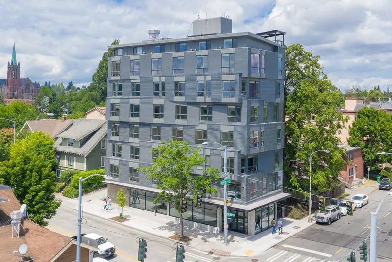 Modern apartment building with many windows exterior at Montclair Apartments in Seattle Student Accommodation